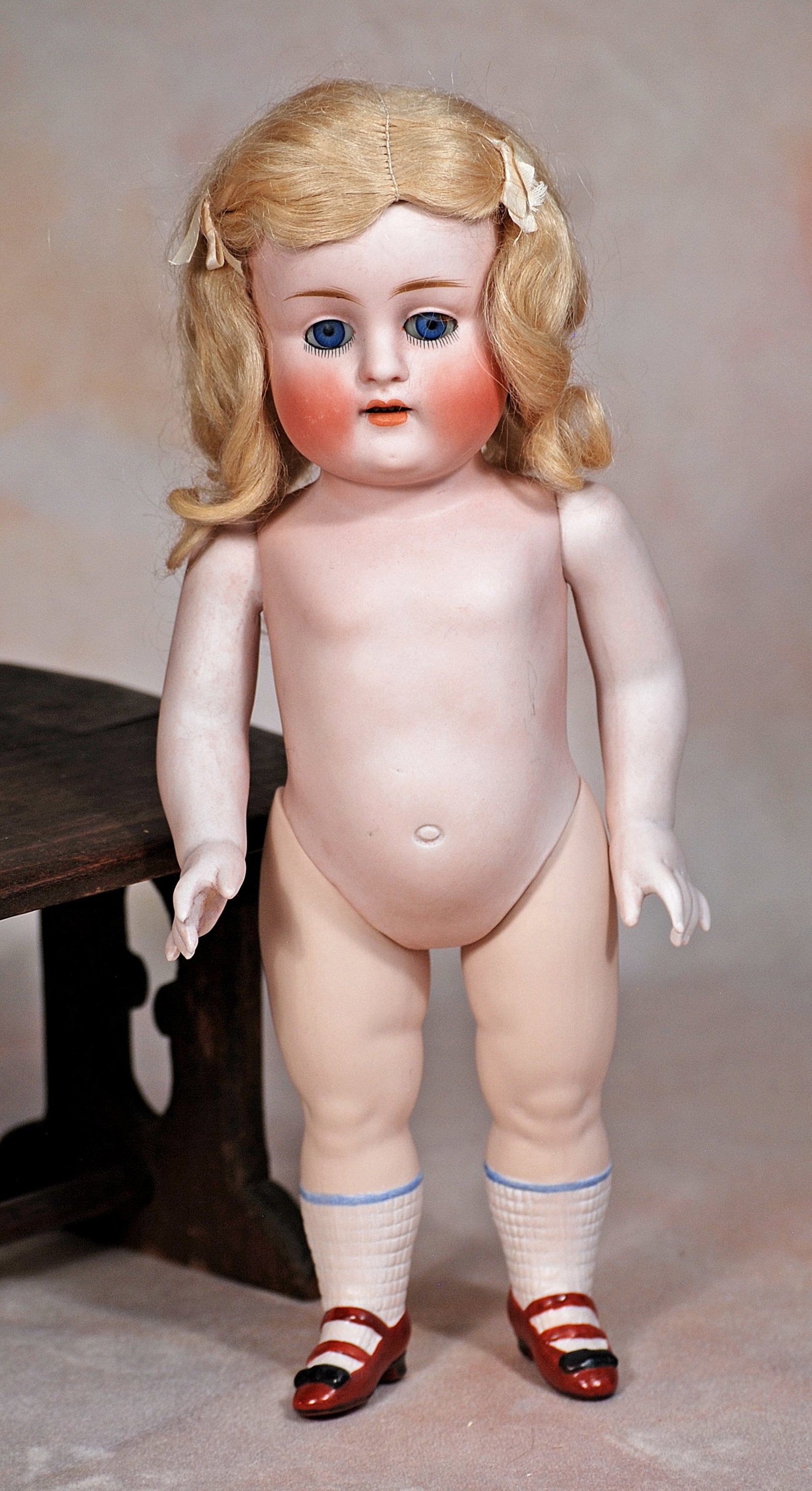 LARGER MODEL OF KESTNER ALL-BISQUE DOLL.: 77. LARGER MODEL OF KESTNER ALL-BISQUE DOLL. 11”. Marks: 150. 6. All-bisque, jointed at shoulders and hips, blue sleep eyes, painted lower lashes, feathered brows, open mouth, shaded lips, upper