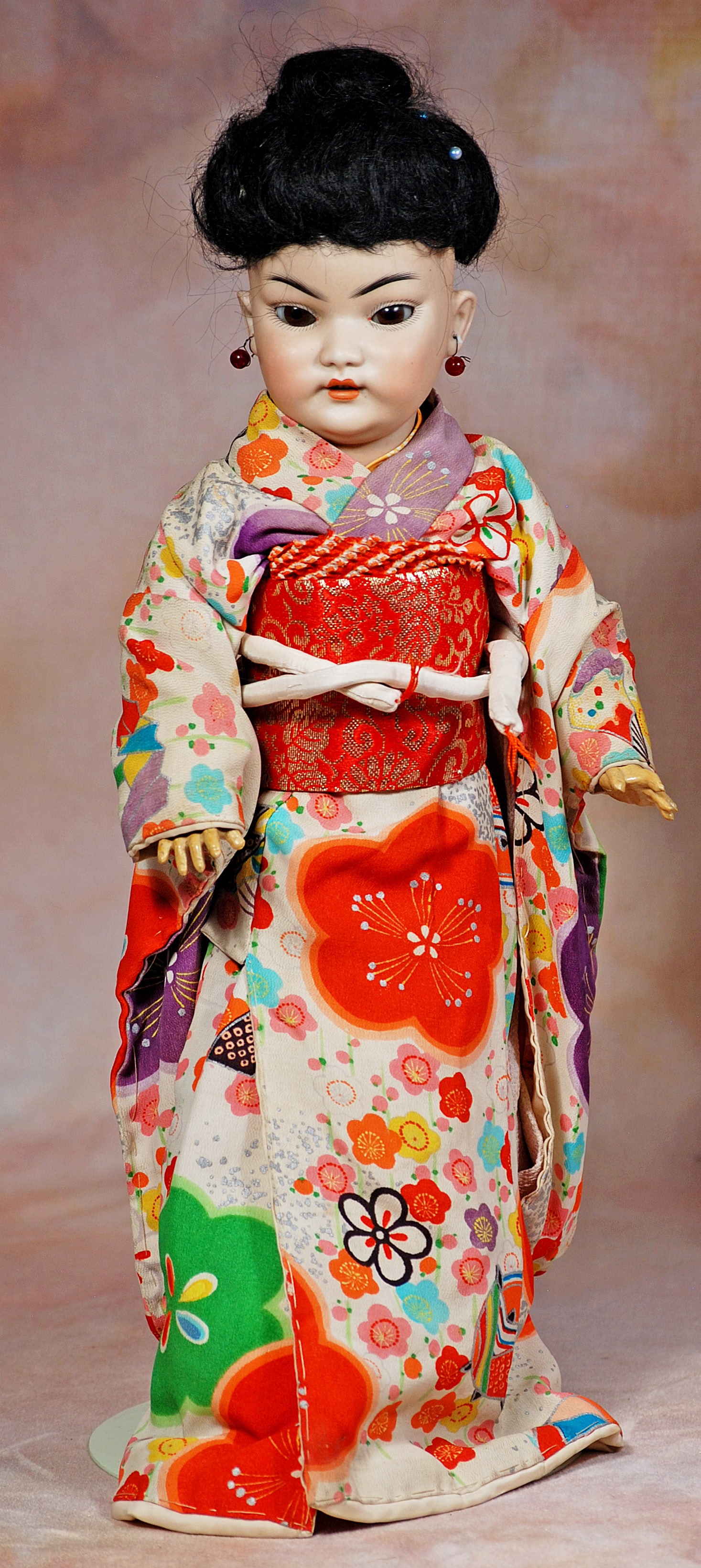 SIMON AND HALBIG ASIAN PORTRAIT DOLL.: 4. SIMON AND HALBIG ASIAN PORTRAIT DOLL. 15”. Marks: S H 1199 Dep Germany. Amber tinted bisque socket head, brown glass eyes in side slant cut, painted lashes, eyeliner, feathered brows,