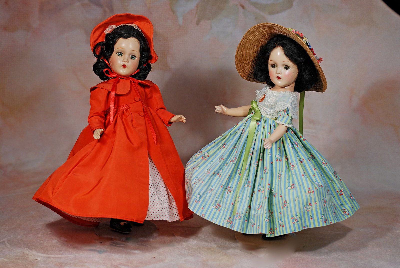 TWO COMPOSITION SCARLETT O’HARA DOLLS BY ALEXANDER.: 5. TWO COMPOSITION SCARLETT O’HARA DOLLS BY ALEXANDER. 15”. Marks: Madame Alexander. Each is composition socket head on five-piece jointed body, green sleep eyes, closed mouth, black wig. One