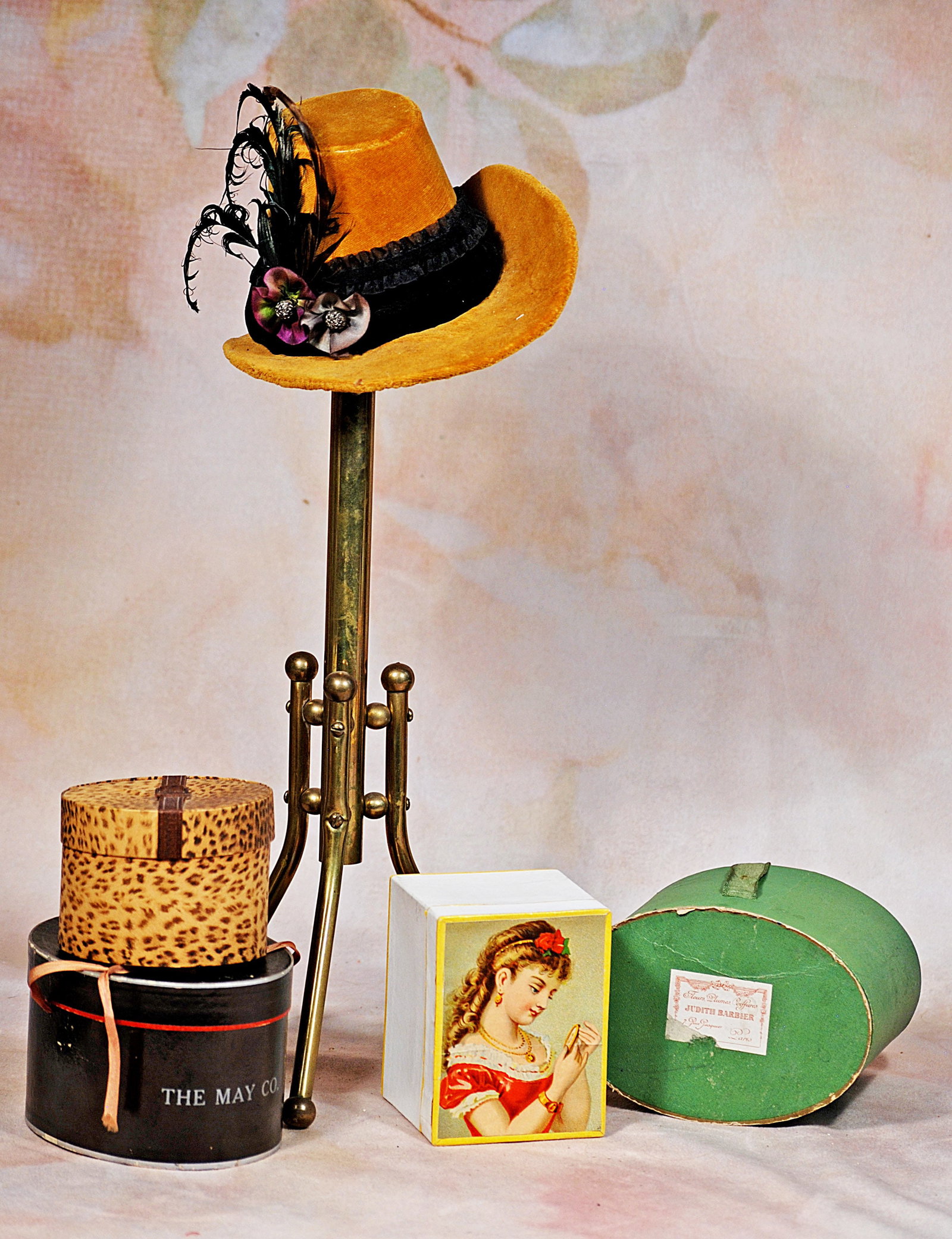 BRASS COAT RACK AND ASSORTED HAT BOXES. (1 of 1)