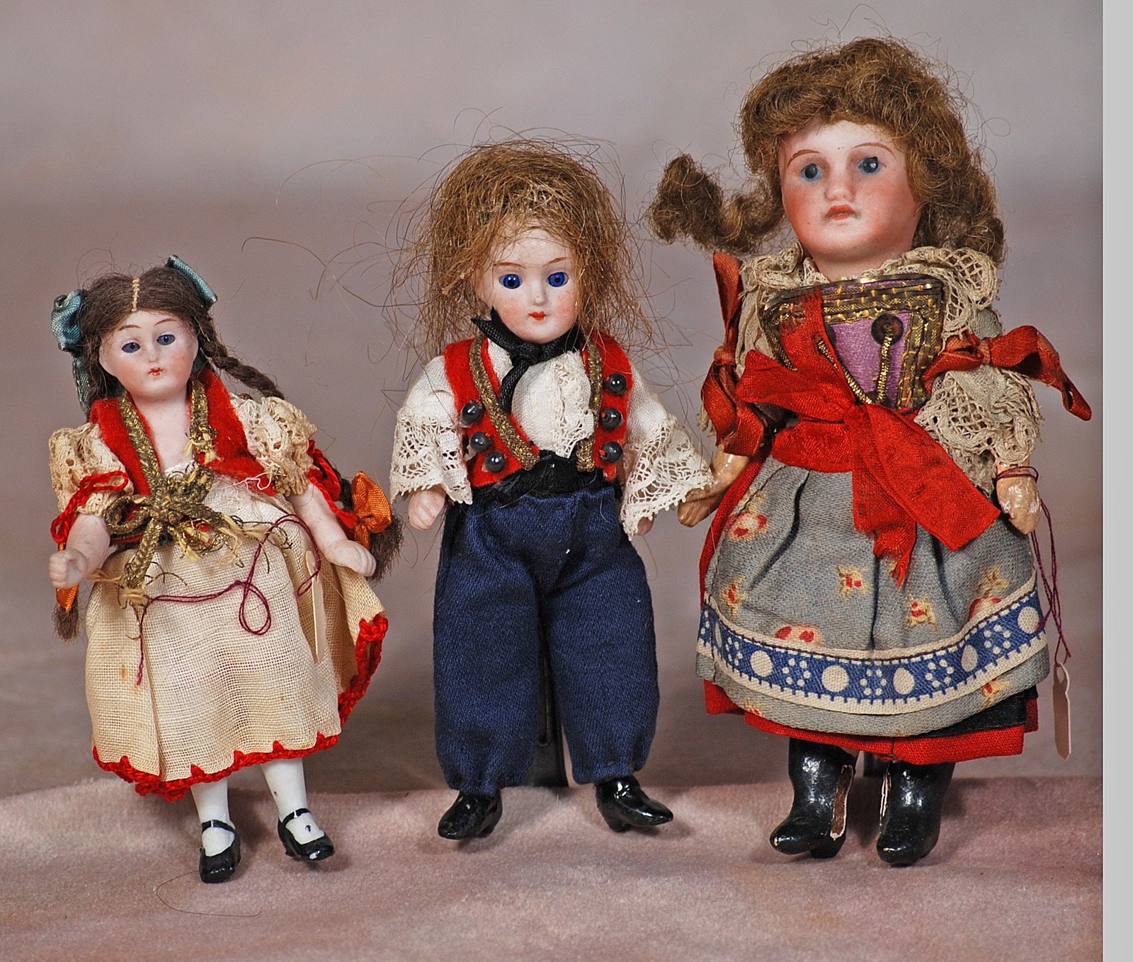 THREE MINIATURE BISQUE DOLL HOUSE DOLLS (1 of 1)