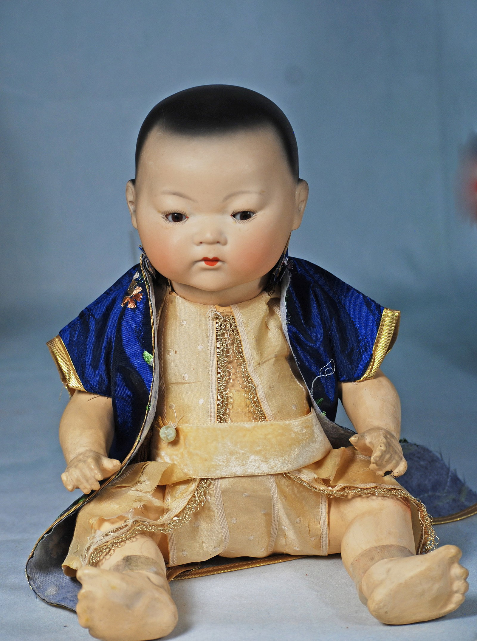 GERMAN BISQUE ASIAN BABY, 353, BY MARSEILLE.: 132. GERMAN BISQUE ASIAN BABY, 353, BY MARSEILLE. 14”. Marks: A.M. Germany 353 3 ½ k. Solid dome bisque socket head with painted black hair, brown sleep eyes, painted lashes, tinted