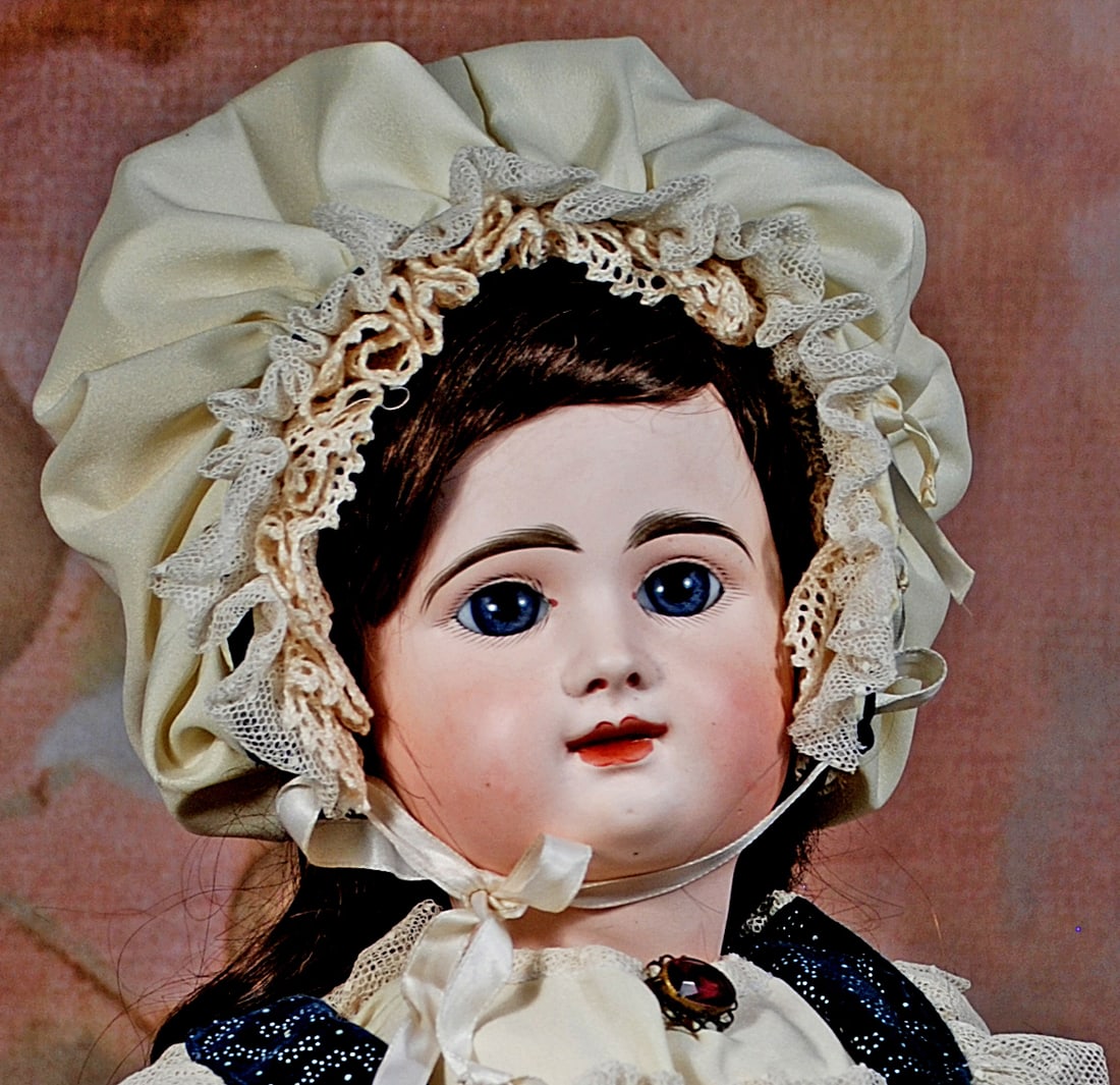 FRENCH BISQUE BEBE – MYSTERY MAKER.: 135. FRENCH BISQUE BEBE – MYSTERY MAKER. 25”. Marks: 2 B. Bisque socket head, blue paperweight eyes, painted lashes, feathered brows, pierced ears, closed mouth, shaded and accented lips, brun