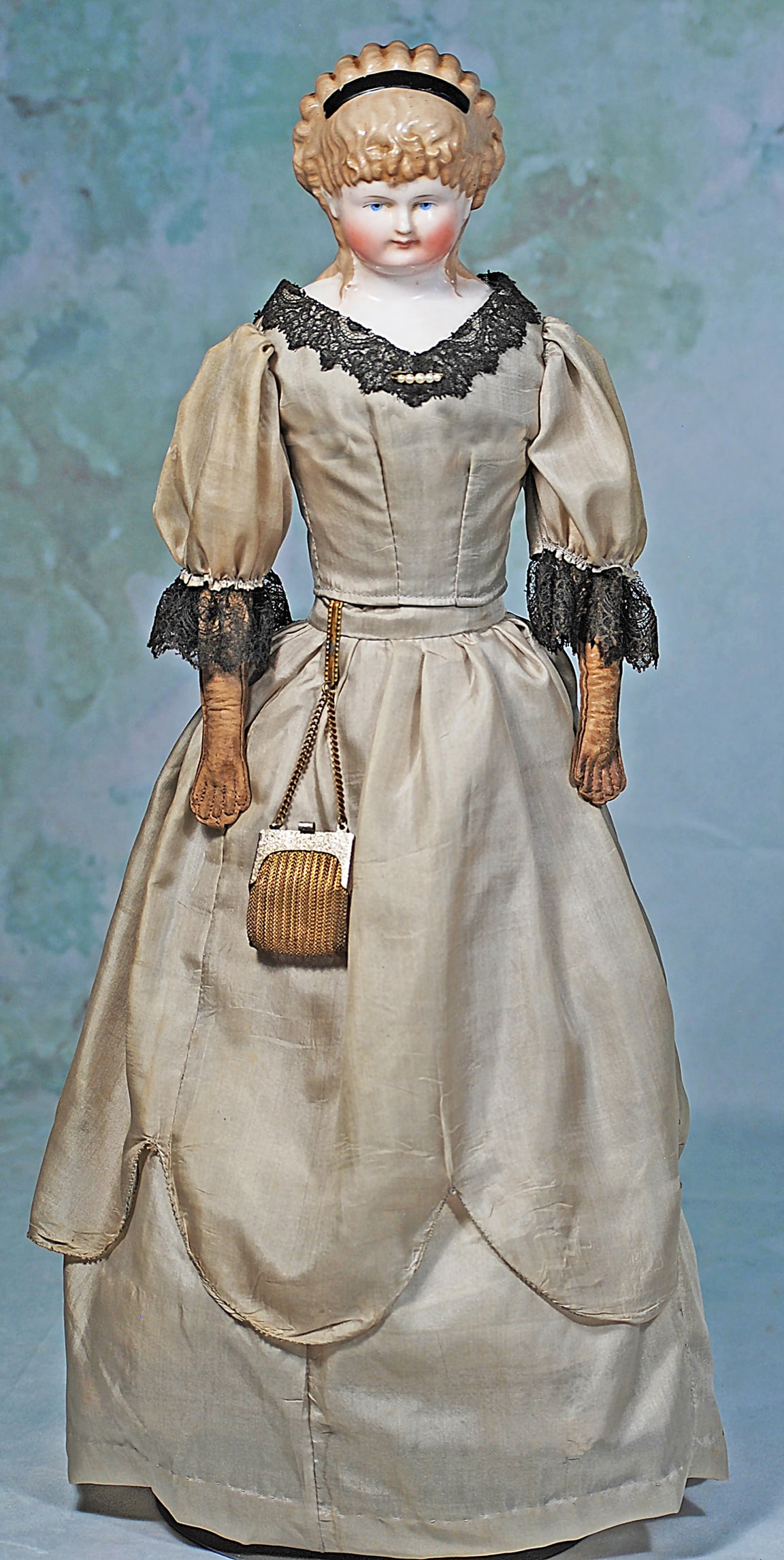 GERMAN PORCELAIN LADY WITH CAFÉ AULAIT HAIR IN ELABORATE RINGLETS (1 of 2)