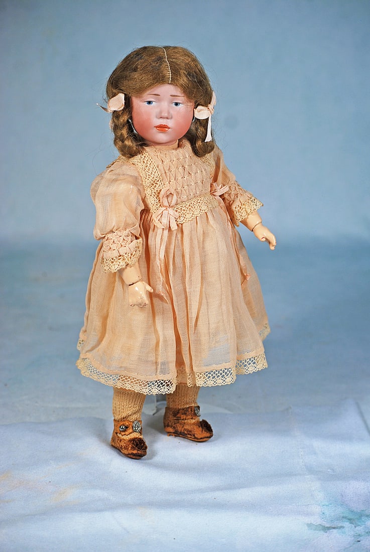 PETITE GERMAN BISQUE ART CHARACTER “MARIE” BY KAMMER AND REINHARDT (1 of 2)