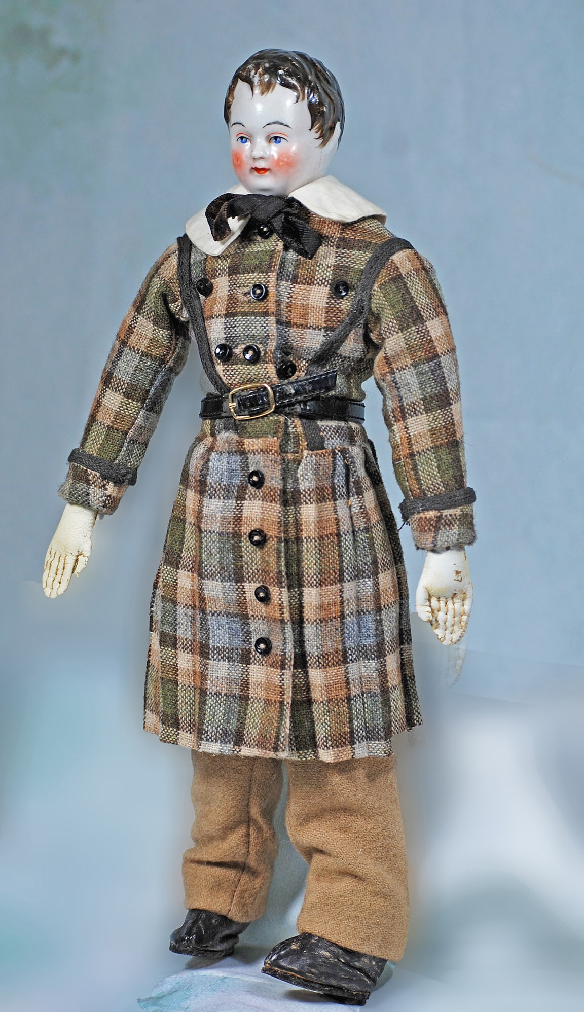 GERMAN PORCELAIN DOLL WITH SCULPTED BROWN BOYISH HAIR (1 of 3)