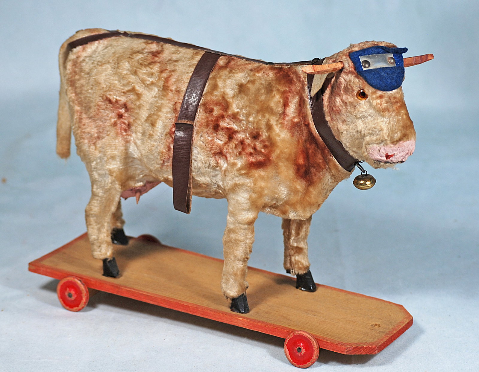 GERMAN PULL-TOY COW ON WHEELED BASE (1 of 1)