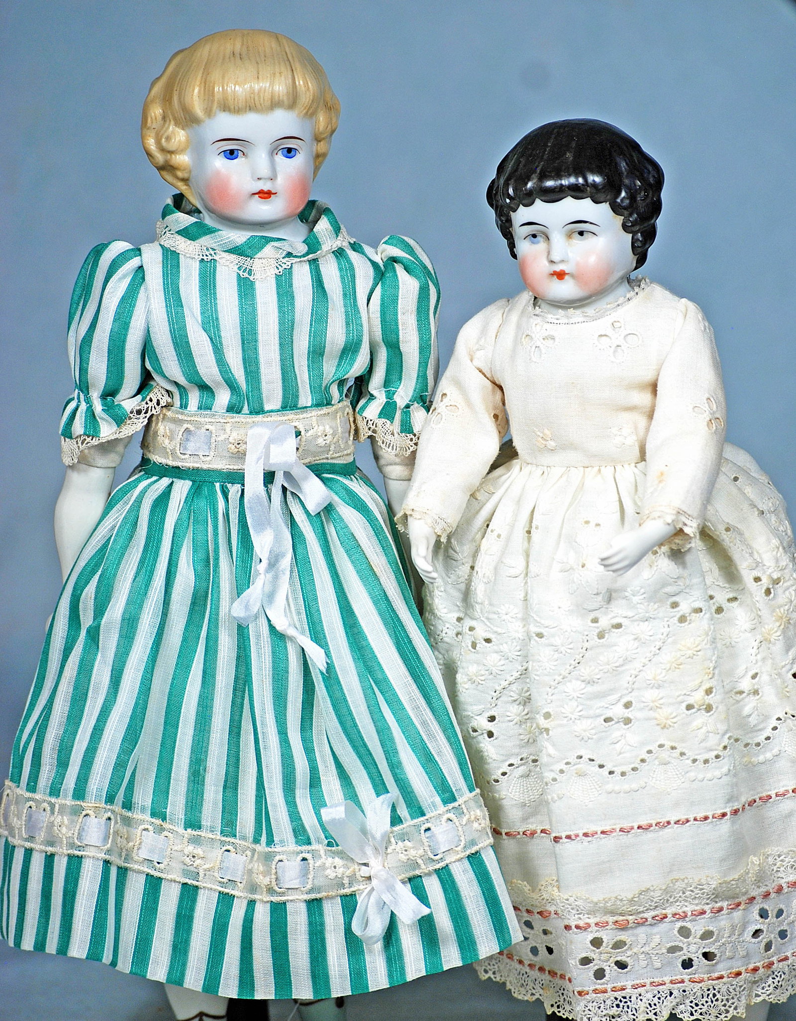 TWO GERMAN PORCELAIN LADY DOLLS WITH SCULPTED BANGS (1 of 2)