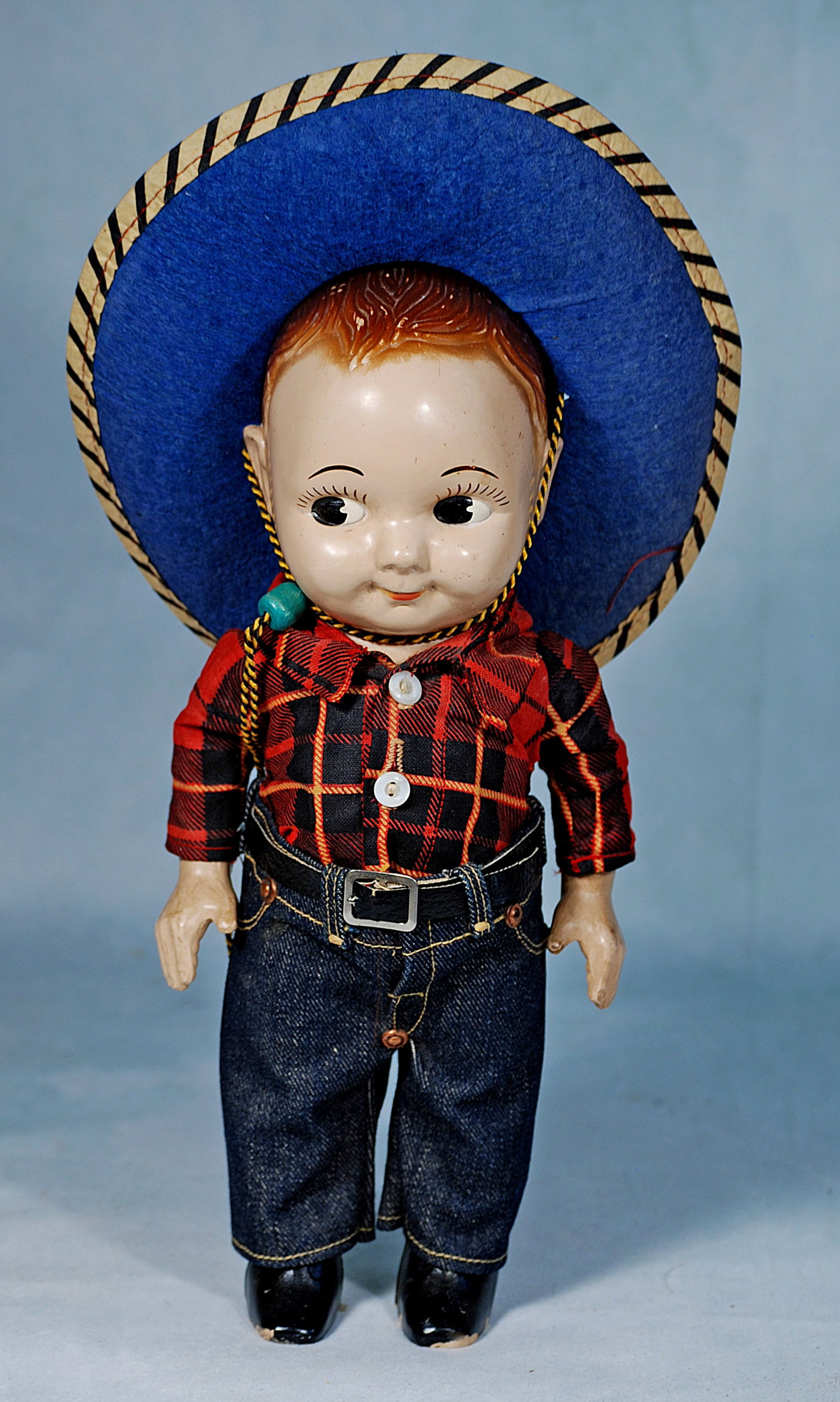 HARD PLASTIC BUDDY LEE DOLL IN ORIGINAL COSTUME.: 277. HARD PLASTIC BUDDY LEE DOLL IN ORIGINAL COSTUME. 13”. Hard Plastic, jointed at shoulders, painted brown hair, painted features, side-glancing dark eye, painted black boots, wears his