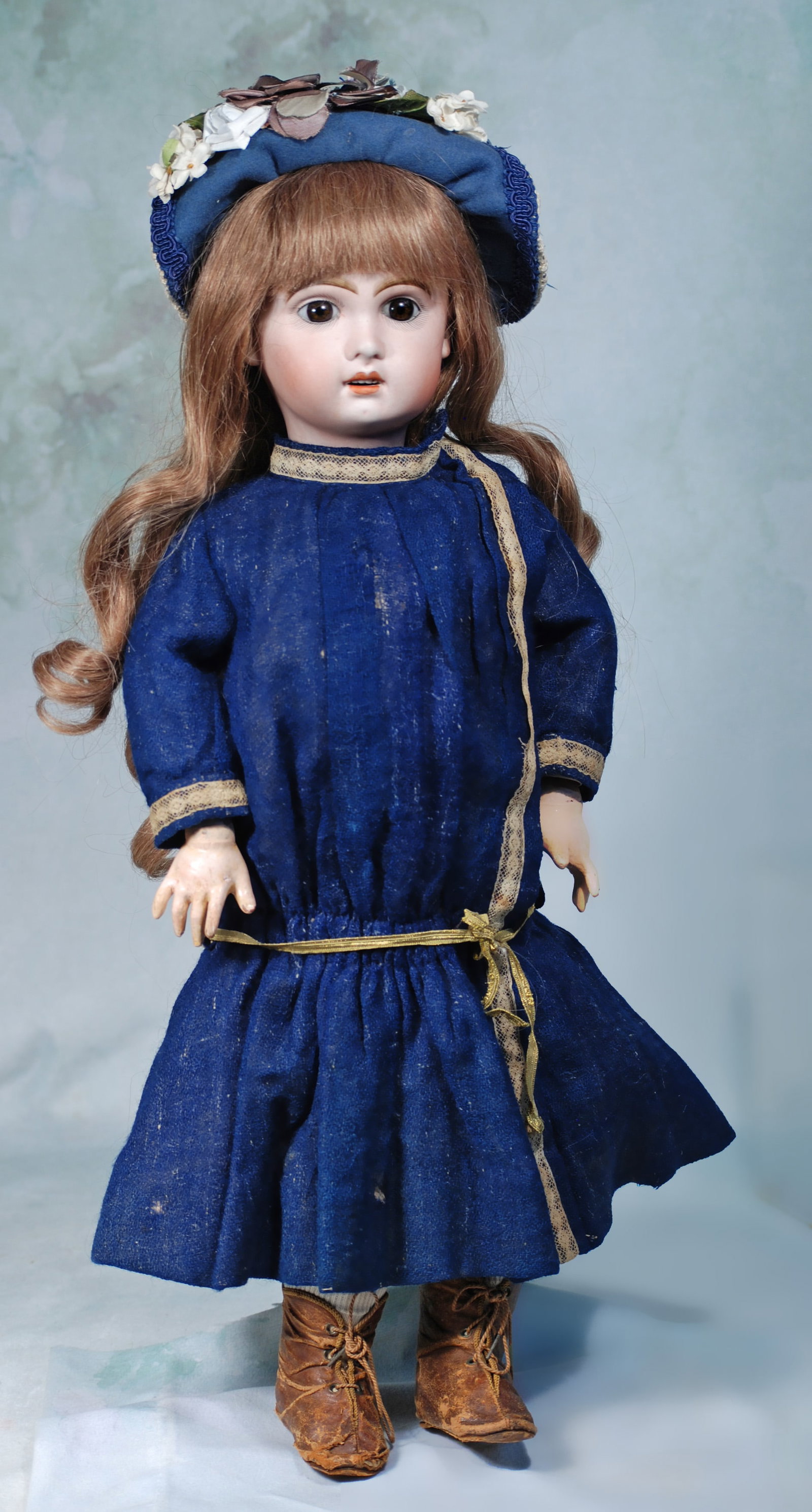 FRENCH BISQUE BEBE, MODEL X, BY JUMEAU.: 280. FRENCH BISQUE BEBE, MODEL X, BY JUMEAU. 22”. Marks: X 8. Bisque socket head, brown paperweight eyes, painted lashes, eyeliner, feathered brows, pierced ears, open mouth, accented lips,