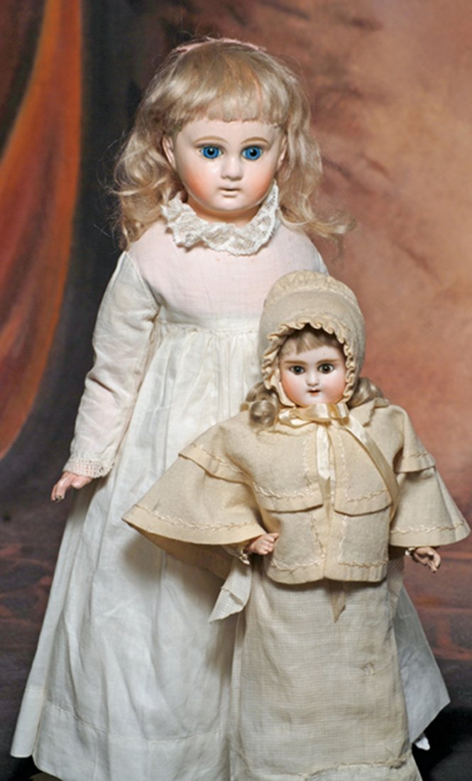 GERMAN BISQUE DOLL BY ALT, BECK & GOTTSCHALCK. Marks:: GERMAN BISQUE DOLL BY ALT, BECK & GOTTSCHALCK. Marks: 3 ½. 13”. Turned bisque shoulderhead, inset brown glass eyes, painted lashes, feathered brows, open mouth, upper teeth, original blonde mohair