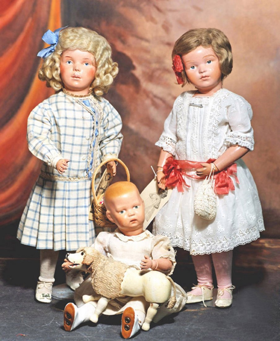 SCHOENHUT CARVED WOODEN CHARACTER GIRL #308C. Marks:: SCHOENHUT CARVED WOODEN CHARACTER GIRL #308C. Marks: Schoenhut oval sticker. 19”. Carved wooden socket head, spring-jointed wooden body, painted features, blue intaglio eyes, upper eyeliner, feather