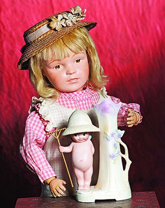 LARGE MODEL OF SCHOENHUT POUTY GIRL WITH LOVELY: LARGE MODEL OF SCHOENHUT POUTY GIRL WITH LOVELY COMPLEXION. Marks: Incised Schoenhut mark. 22”. Carved wooden socket head, spring-jointed wooden body, intaglio browns eyes with upper eyeliner, feath