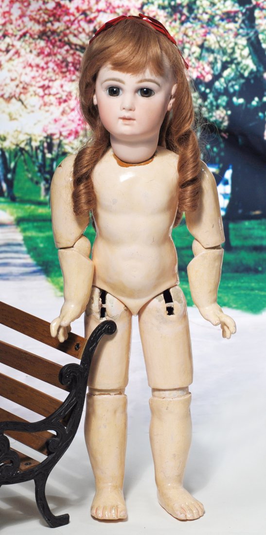 FRENCH BISQUE PORTRAIT BEBE BY JUMEAU. Marks: 9. 20”.: FRENCH BISQUE PORTRAIT BEBE BY JUMEAU. Marks: 9. 20”. Bisque socket head, brown paperweight eyes, painted lashes, mauve-blushed eyelids, feathered and brushstroked brows, pierced ears, closed mouth,