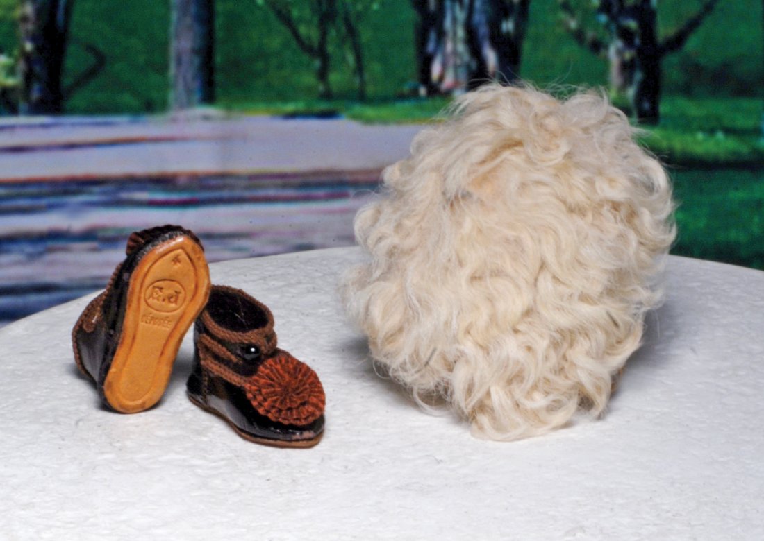 LAMBS WOOL FRENCH WIG FOR BEBE JUMEAU. Short feathery: LAMBS WOOL FRENCH WIG FOR BEBE JUMEAU. Short feathery waves and curls of pale lambs wool over fitted cap, sized for approximately 6” head circumference. Commentary: One spot of wear at top of cap, o