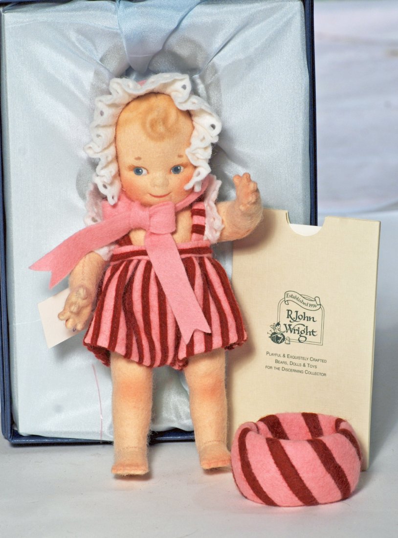 R. JOHN WRIGHT “FIRST PEPPERMINT SCOOTLES: R. JOHN WRIGHT “FIRST PEPPERMINT SCOOTLES. 6". All-felt, fully-jointed with painted features and hair, dressed in scarlet, pink and white felt outfits, accompanying RJW all-felt "Peppermint" Napkin
