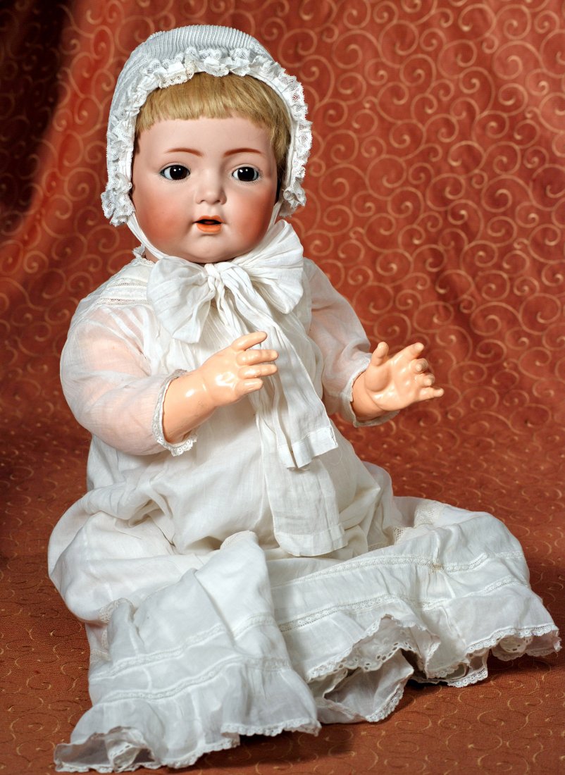 LIFE-SIZE GERMAN BISQUE CHARACTER, MODEL 121, BY KAMMER: LIFE-SIZE GERMAN BISQUE CHARACTER, MODEL 121, BY KAMMER & REINHARDT. Marks: K * R, Simon & Halbig 121, 62. 26”. Bisque socket head, brown sleep eyes, painted curly lashes, feathered brows, open mout