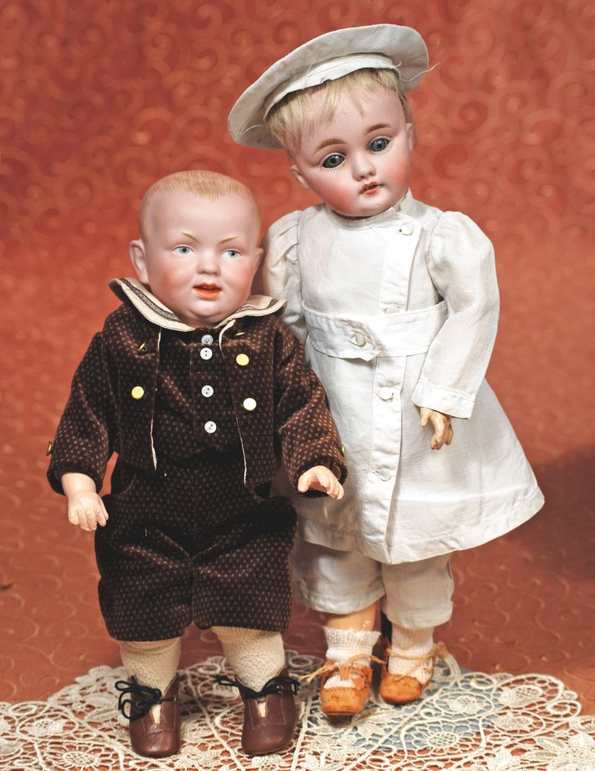 GERMAN BISQUE CHARACTER, 143, BY KESTNER: GERMAN BISQUE CHARACTER, 143, BY KESTNER. Marks: Made in B Germany G, 143. 13 ½”. Bisque socket head, blue sleep eyes, painted lashes, feathered brows, open mouth, accented lips, two upper teeth, o
