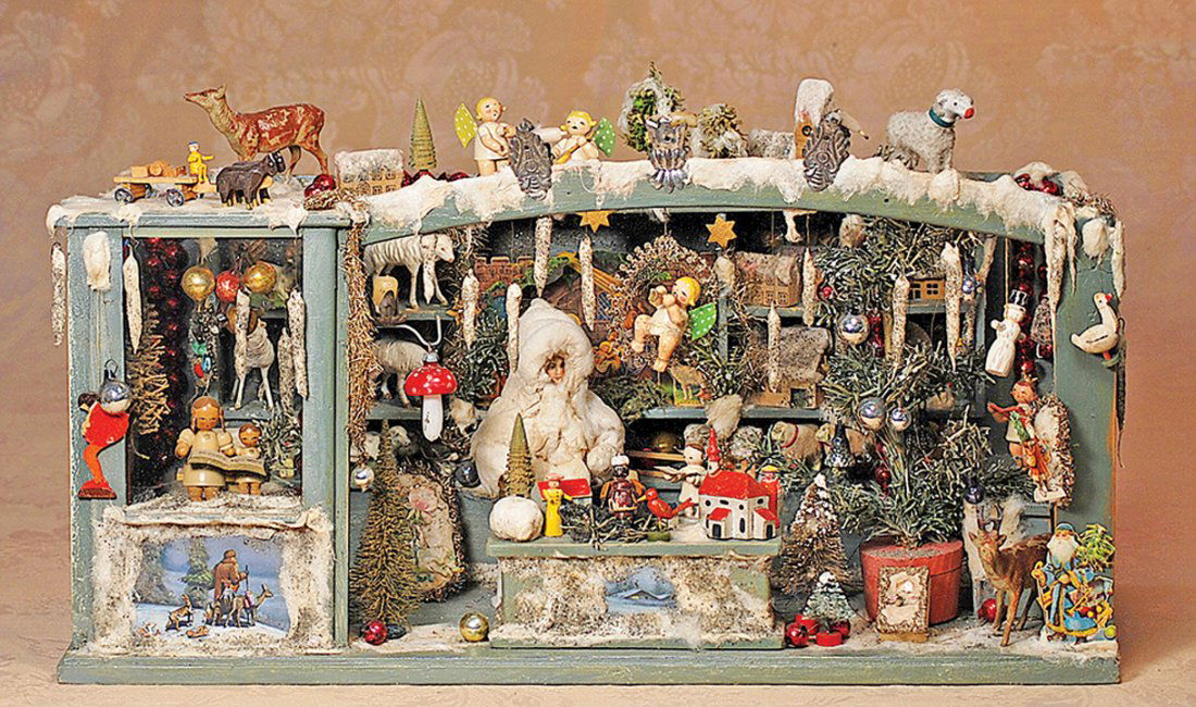 GERMAN DOLLHOUSE, CHRISTMAS STORE ROOM BOX: ANTIQUE DOLL HOUSE CHRISTMAS STORE ROOM BOX FROM GERMANY, WITH MUSICAL MOVEMENT. 22” W. x 11” H. x 9 ½” D. Wooden store display box has painted finish, front side panel with glass store window