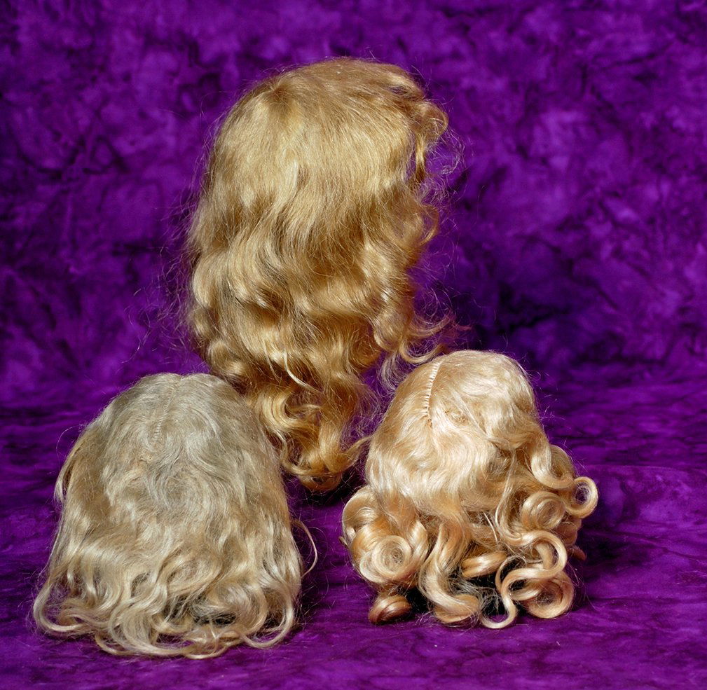 THREE DOLL WIGS. (1 of 1)