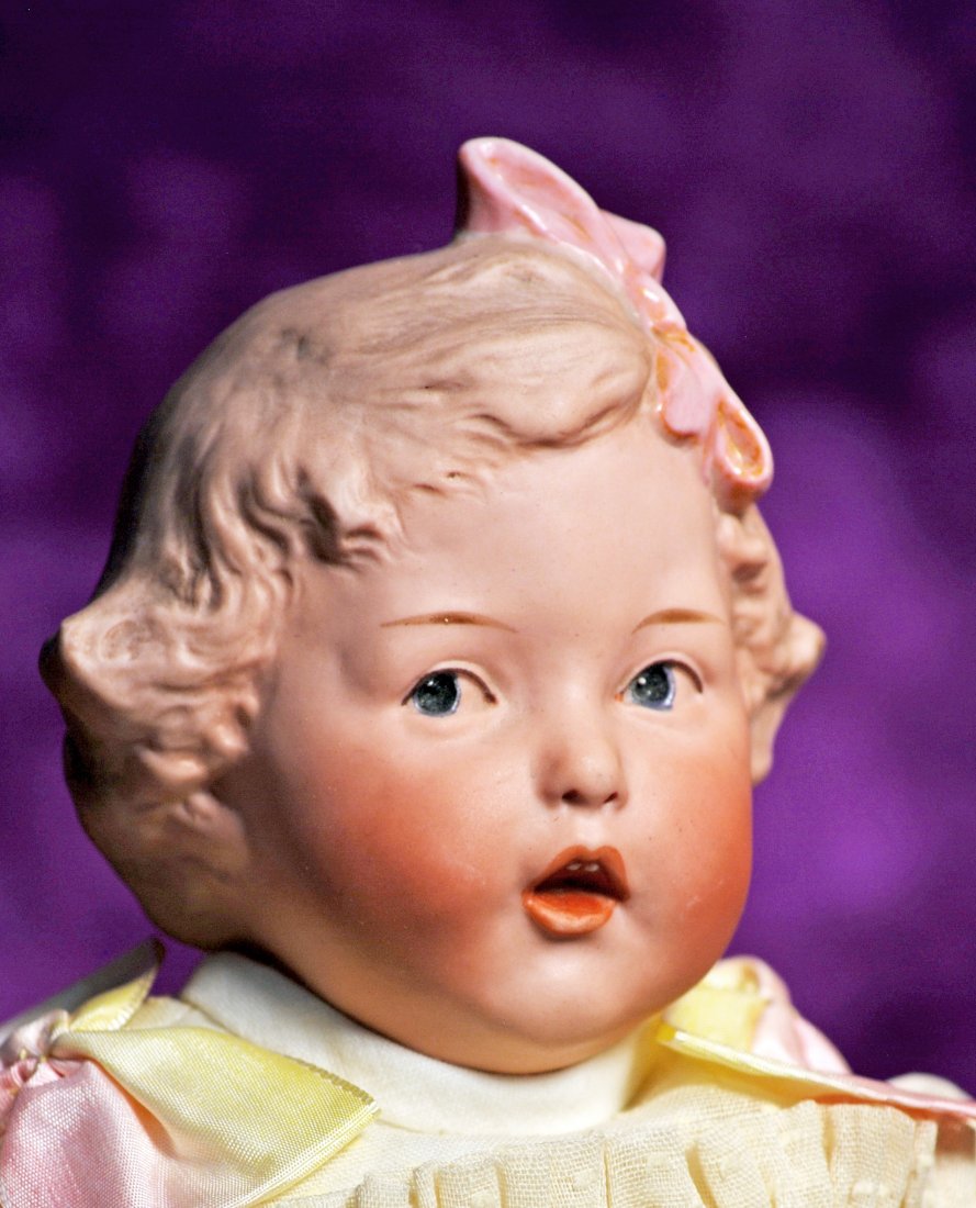 GERMAN BISQUE “SINGING HEUBACH” CHARACTER GIRL.  Marks: (1 of 2)