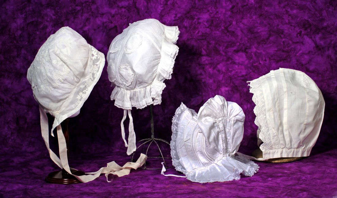 FOUR ANTIQUE BONNETS FOR LARGE DOLLS. (1 of 1)