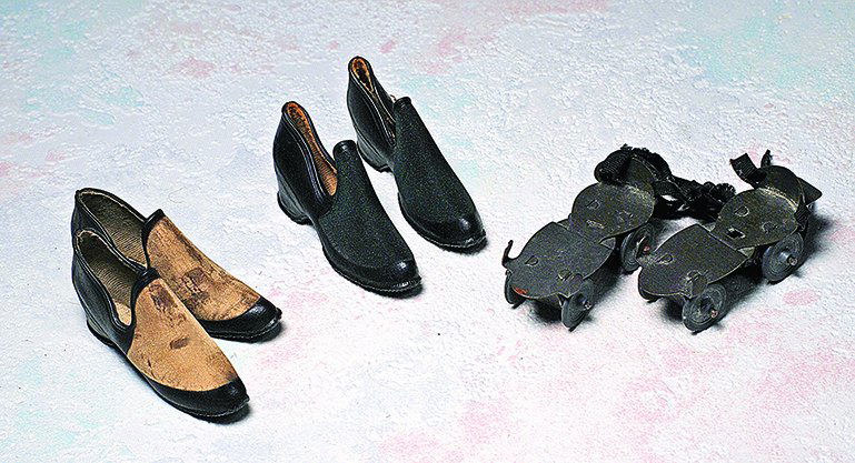 SALESMAN SAMPLE GALOSHES AND ROLLER SKATES.  Two pair (1 of 1)