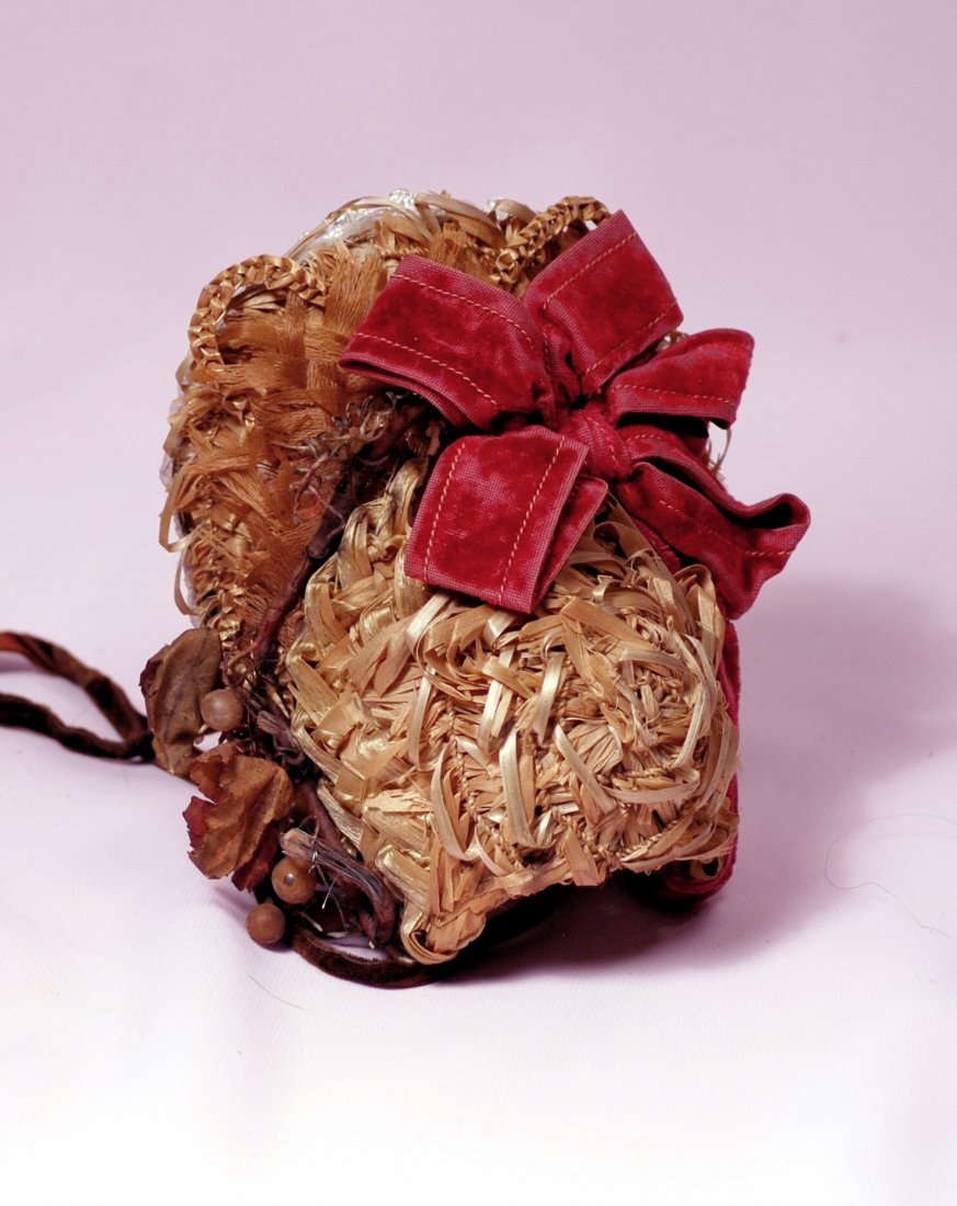 ANTIQUE WOVEN STRAW DOLL BONNET.  Woven natural straw (1 of 1)
