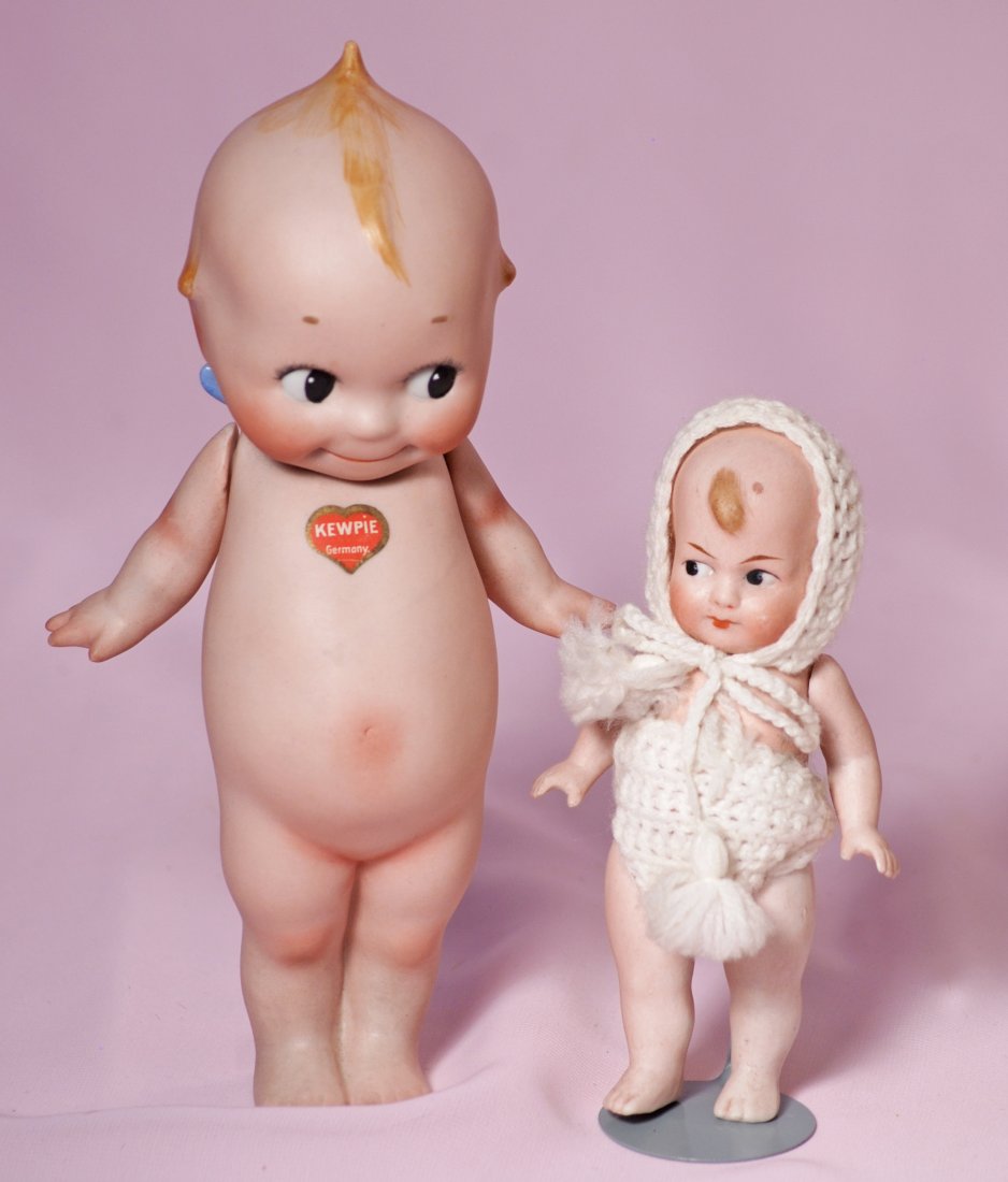 TWO ALL-BISQUE DOLLS - LARGE KEWPIE AND KEWPIE TYPE. (1 of 1)