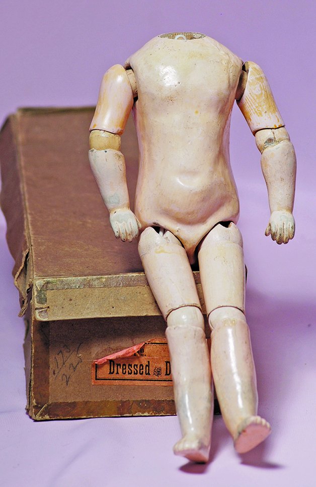 GERMAN DOLL BODY & TWO DOLL WIGS. 10”.  Composition and (1 of 2)