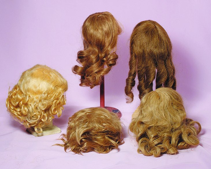 FIVE VINTAGE DOLL WIGS.  Two mohair wigs and three (1 of 1)