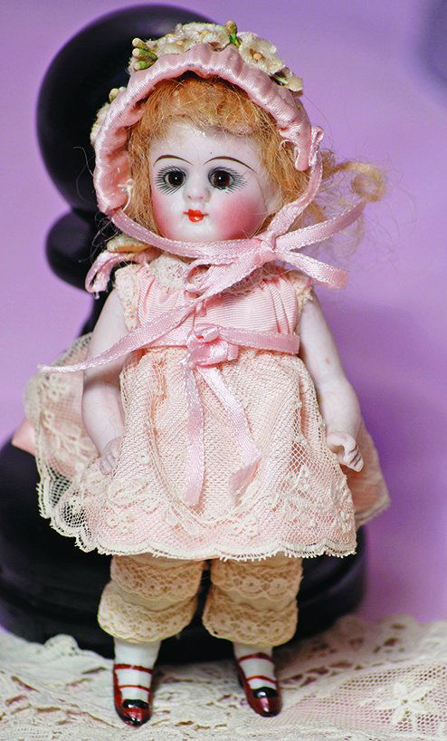 TWO GERMAN ALL-BISQUE DOLLS; ONE STIFF NECK AND ONE (1 of 3)