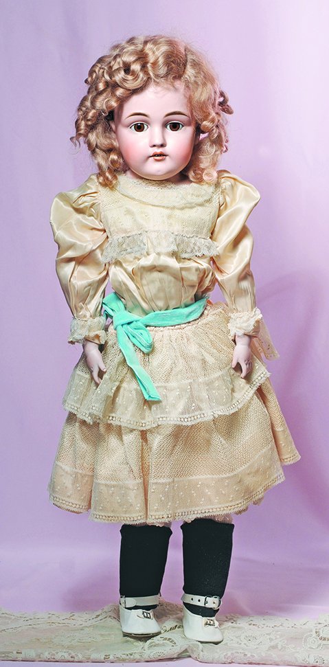 GERMAN BISQUE DOLL BY KESTNER. Marks: 154 dep. 27”.: GERMAN BISQUE DOLL BY KESTNER. Marks: 154 dep. 27”. Bisque shoulderhead, brown sleep eyes, painted lashes, feathered brows, open mouth, accented lips, upper teeth, light brown mohair wig, kid body w