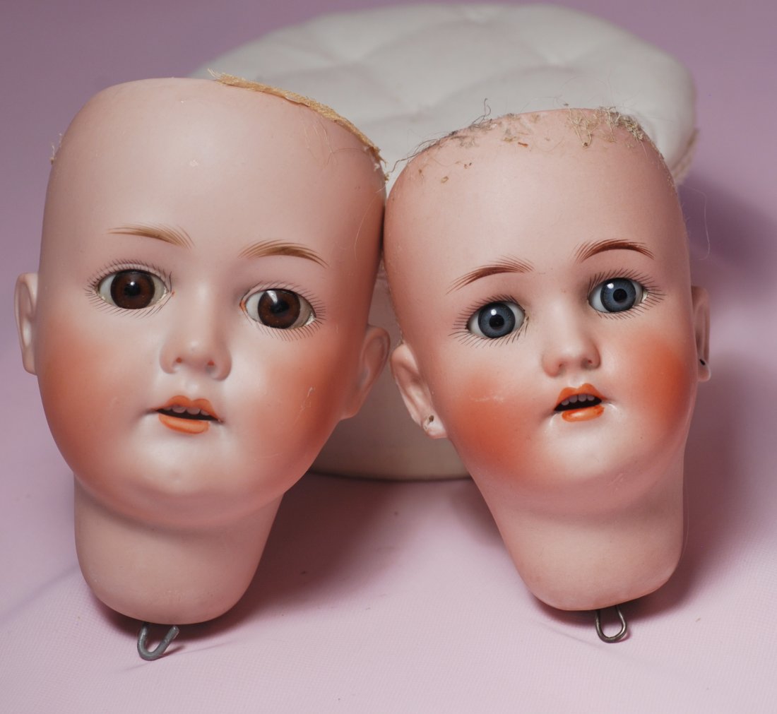 TWO GERMAN BISQUE DOLL HEADS (1 of 1)