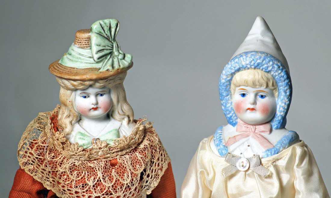 TWO GERMAN BISQUE DOLLS WITH MOLDED BONNETS.  10 (1 of 2)