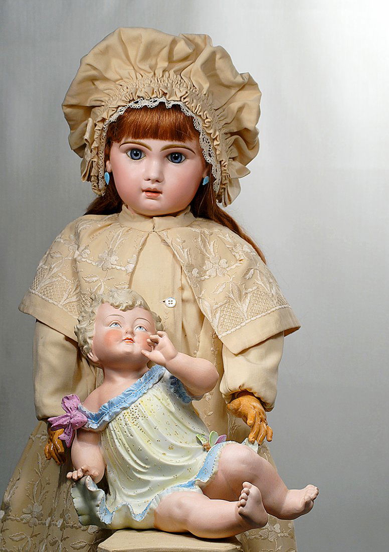 CONTA & BOEHME BISQUE PIANO BABY.  9 1/2”. Seated (1 of 2)