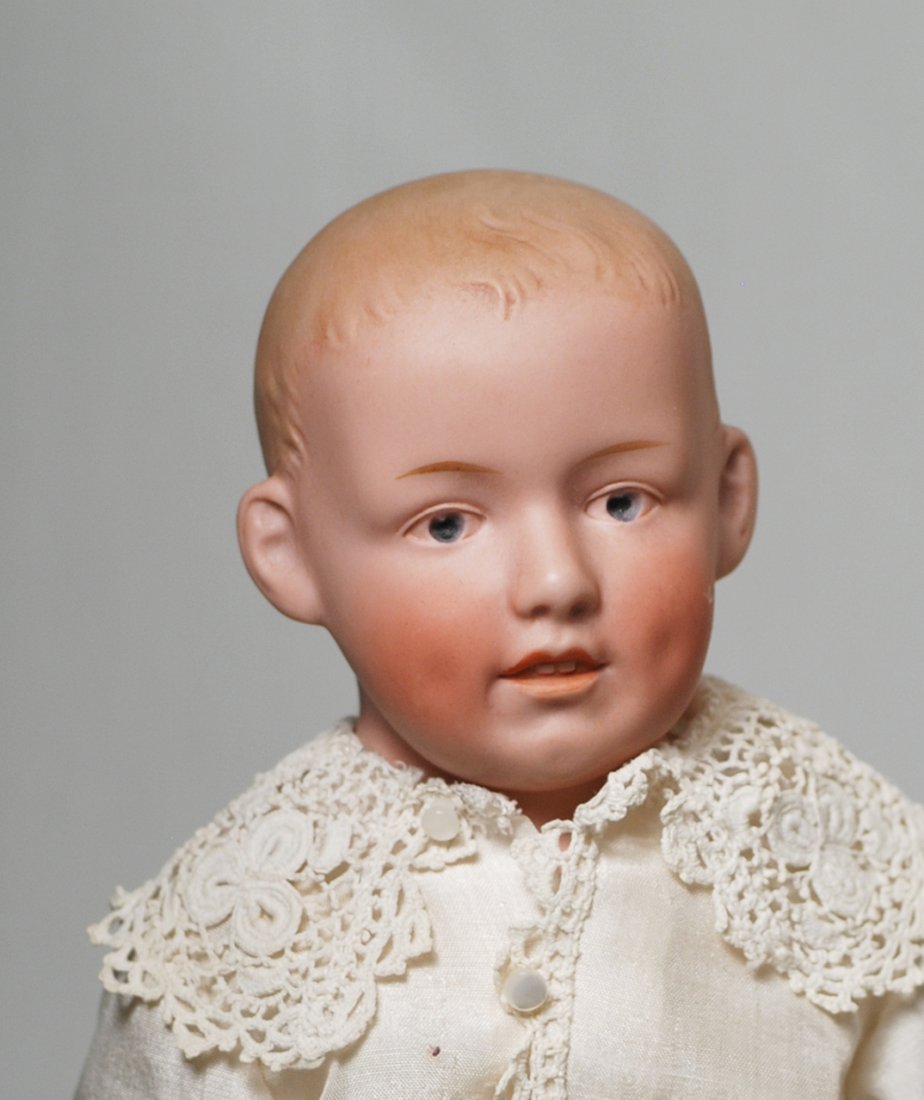 GERMAN BISQUE CHARACTER BY BY GEBRUDER HEUBACH. Marks:: GERMAN BISQUE CHARACTER BY BY GEBRUDER HEUBACH. Marks: Germany 7844 12”. Bisque shoulderhead with sculpted and painted blonde hair,.painted features, blue intaglio eyes, tapered brows, open/closed m