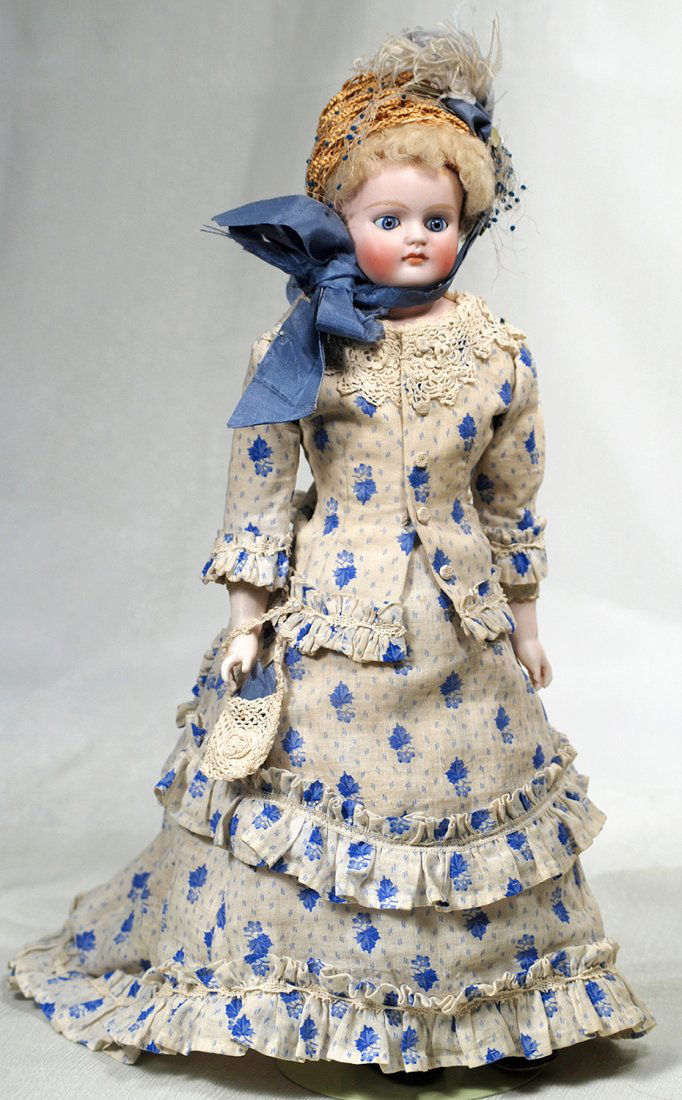 GERMAN BISQUE CLOSED-MOUTH LADY DOLL.  Marks:  7 15 ”. (1 of 2)