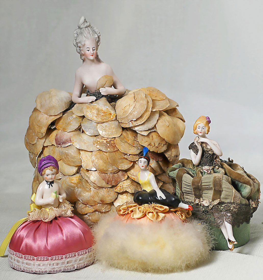 FIVE GERMAN PORCELAIN HALF DOLL NOVELTIES. Includes