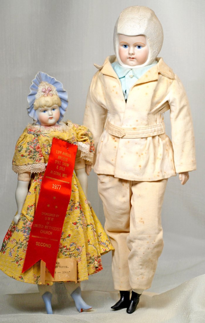 TWO BISQUE BONNET DOLLS BY ARTIST LA MOTTE.  (1) 16” (1 of 1)