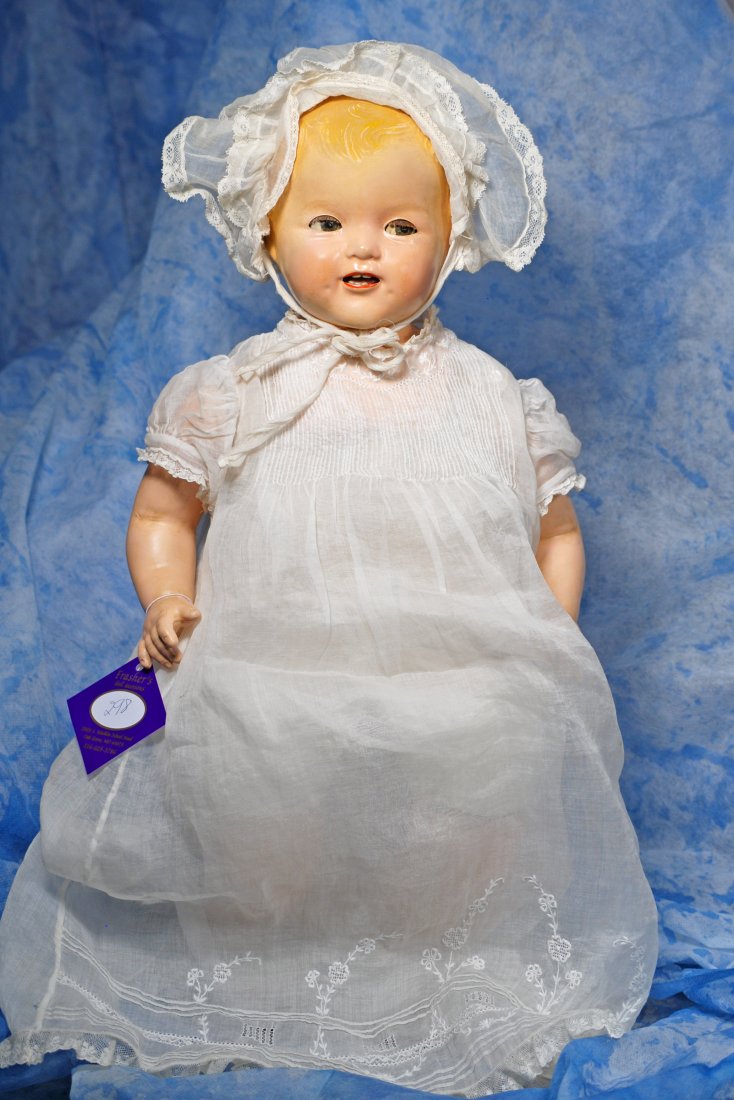 COMPOSITION “BABY SHIRLEY TEMPLE” BY IDEAL.: COMPOSITION “BABY SHIRLEY TEMPLE” BY IDEAL. Marks: Shirley Temple. 21” Composition swivel head on composition shoulderplate, cloth body, composition limbs, painted hair, sleep eyes, applied and