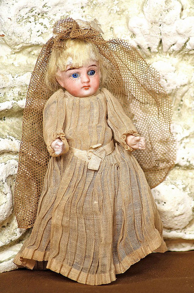 TINY GERMAN BISQUE MIGNONETTE.4 ½”.Bisque swivel head, (1 of 1)