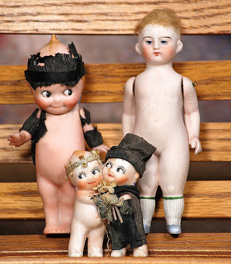 TWO BISQUE KEWPIES AND GERMAN ALL-BISQUE DOLL.Includes: (1 of 1)