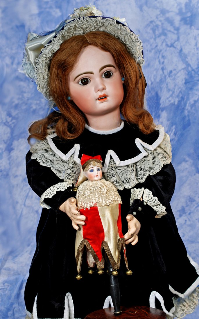 BEAUTIFUL LARGE, SIZE 14, BEBE JUMEAU.Marks: Tete: BEAUTIFUL LARGE, SIZE 14, BEBE JUMEAU.Marks: Tete Jumeau (red stamp) 14 (incised).31 ½”.Bisque socket head, brown paperweight eyes, painted lashes, feathered and brushstroked brows, pierced ears, o