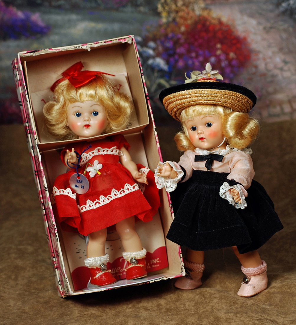 VOGUE GINNY “KAY” #23 FROM KINDERGARTEN AFTERNOON: VOGUE GINNY “KAY” #23 FROM KINDERGARTEN AFTERNOON SERIES.8”.Hard plastic, straight-leg strung doll, blue sleep eyes, painted lashes, rosy cheeks, ruby lips, blonde wig, tagged red organdy dress 