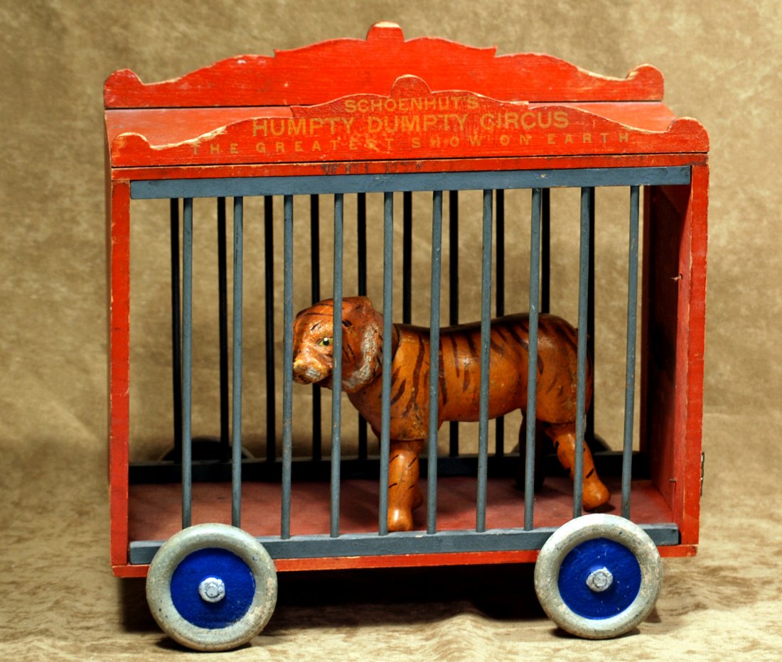 SCHOENHUT WOODEN CAGE WAGON WITH TIGER.11” h. x 12” (1 of 1)