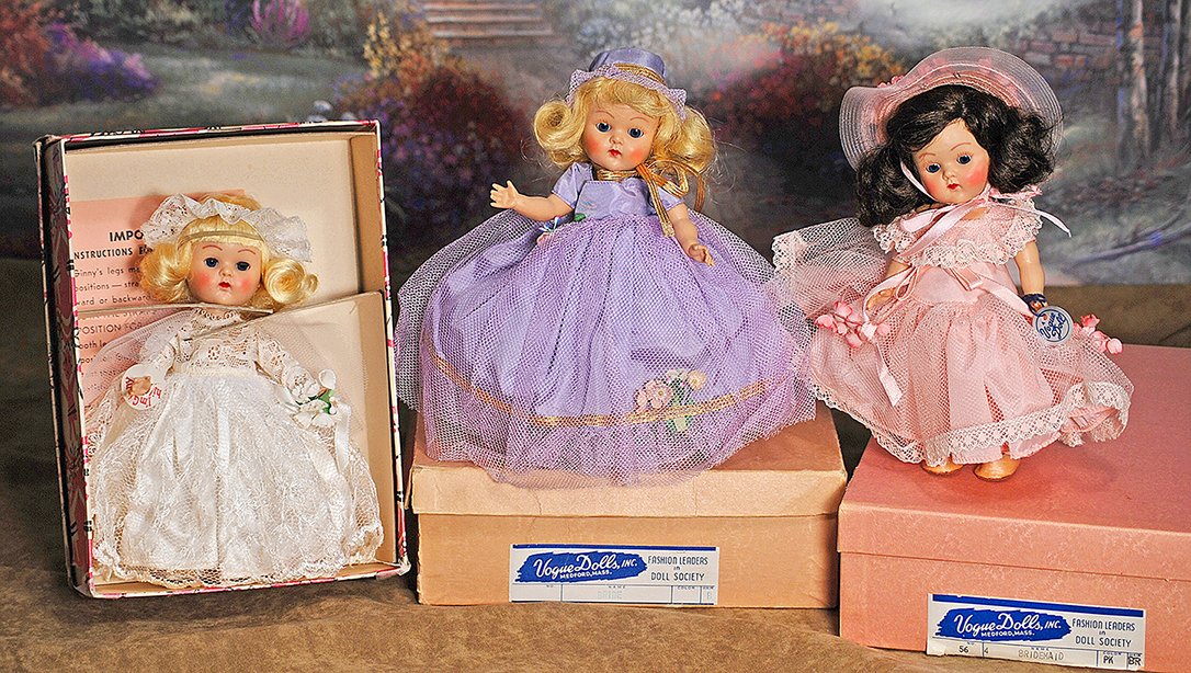 VOGUE GINNY BRIDESMAID IN PINK.8”.Hard plastic,: VOGUE GINNY BRIDESMAID IN PINK.8”.Hard plastic, straight-leg strung doll, blue sleep eyes, painted lashes, rosy cheeks, ruby lips, brunette wig, tagged pink tulle and taffeta gown, picture hat, taff