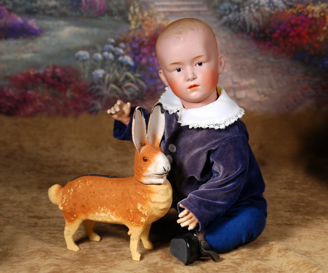 PAPIER MACHE GLASS-EYED RABBIT CANDY CONTAINER.7 ½” H. (1 of 2)