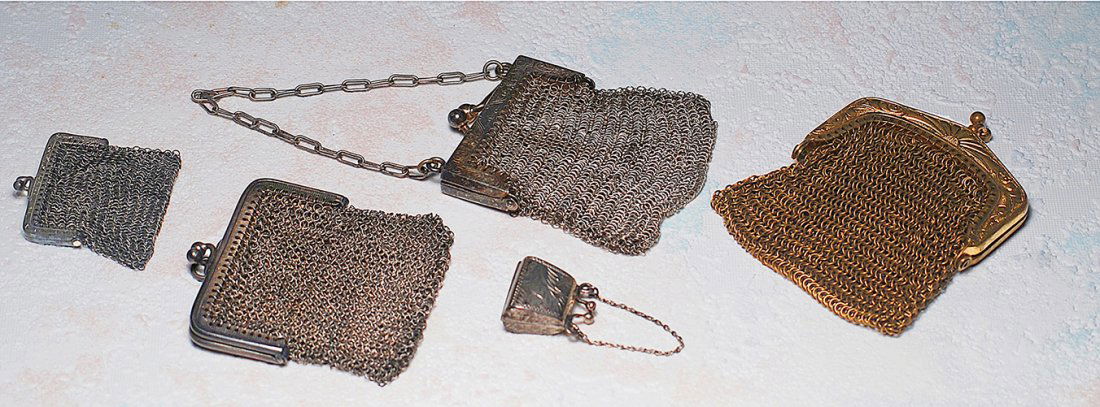FIVE DOLL PURSES. Includes three 1 ¾” to 3” silver mesh (1 of 1)