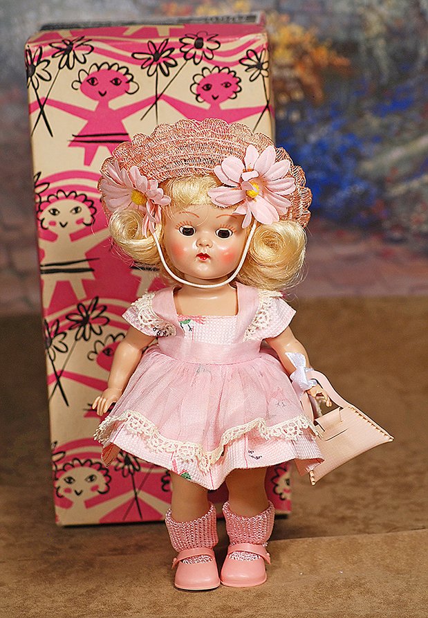VOGUE GINNY TINY MISS SERIES #6039.8”.Hard plastic,: VOGUE GINNY TINY MISS SERIES #6039.8”.Hard plastic, straight-leg walker, brown sleep eyes, painted lashes, blonde wig, tagged pink cotton pique dress with organdy pinafore, organdy panty, pink straw